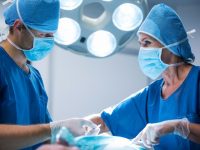 surgeons-performing-operation-operation-room_1170-2228